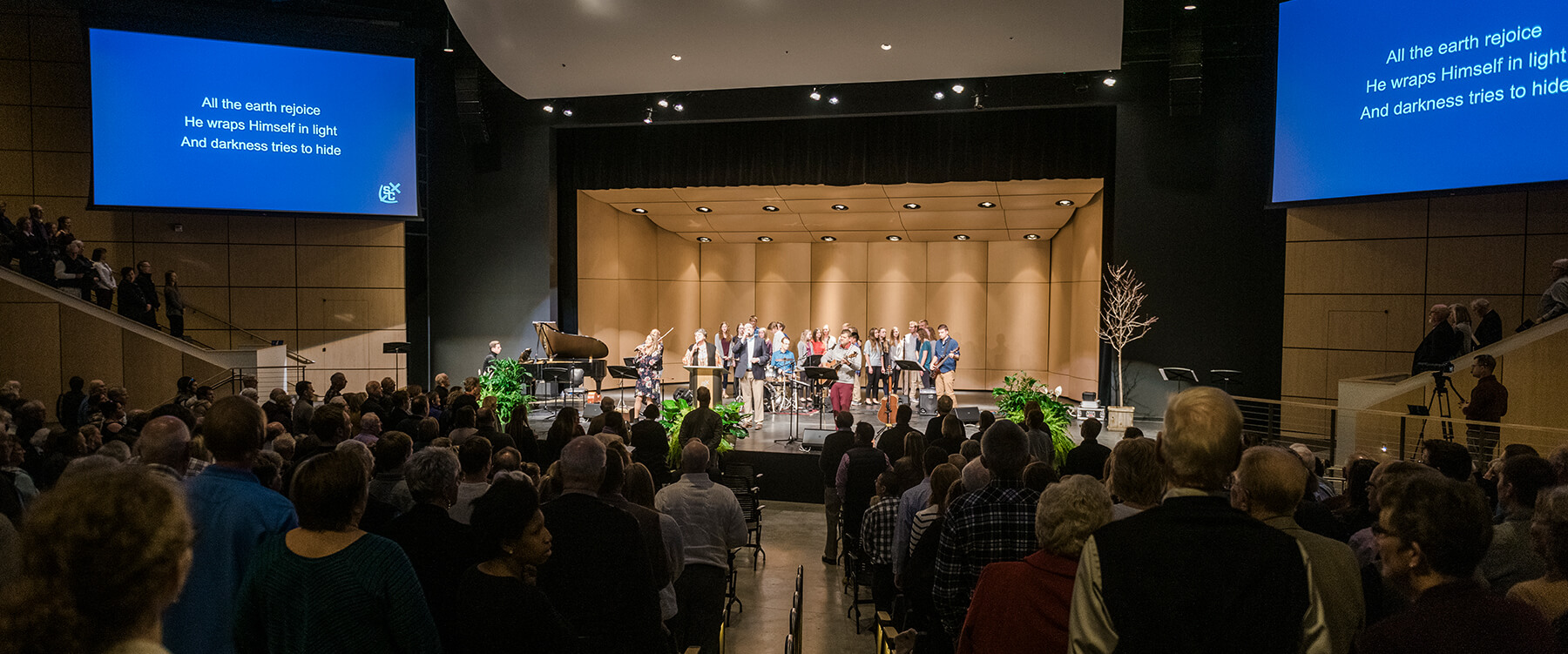 South Christian High School gathering singing in the auditorium