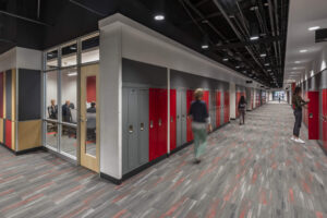 Rendering of students walking down a hallway with lockers