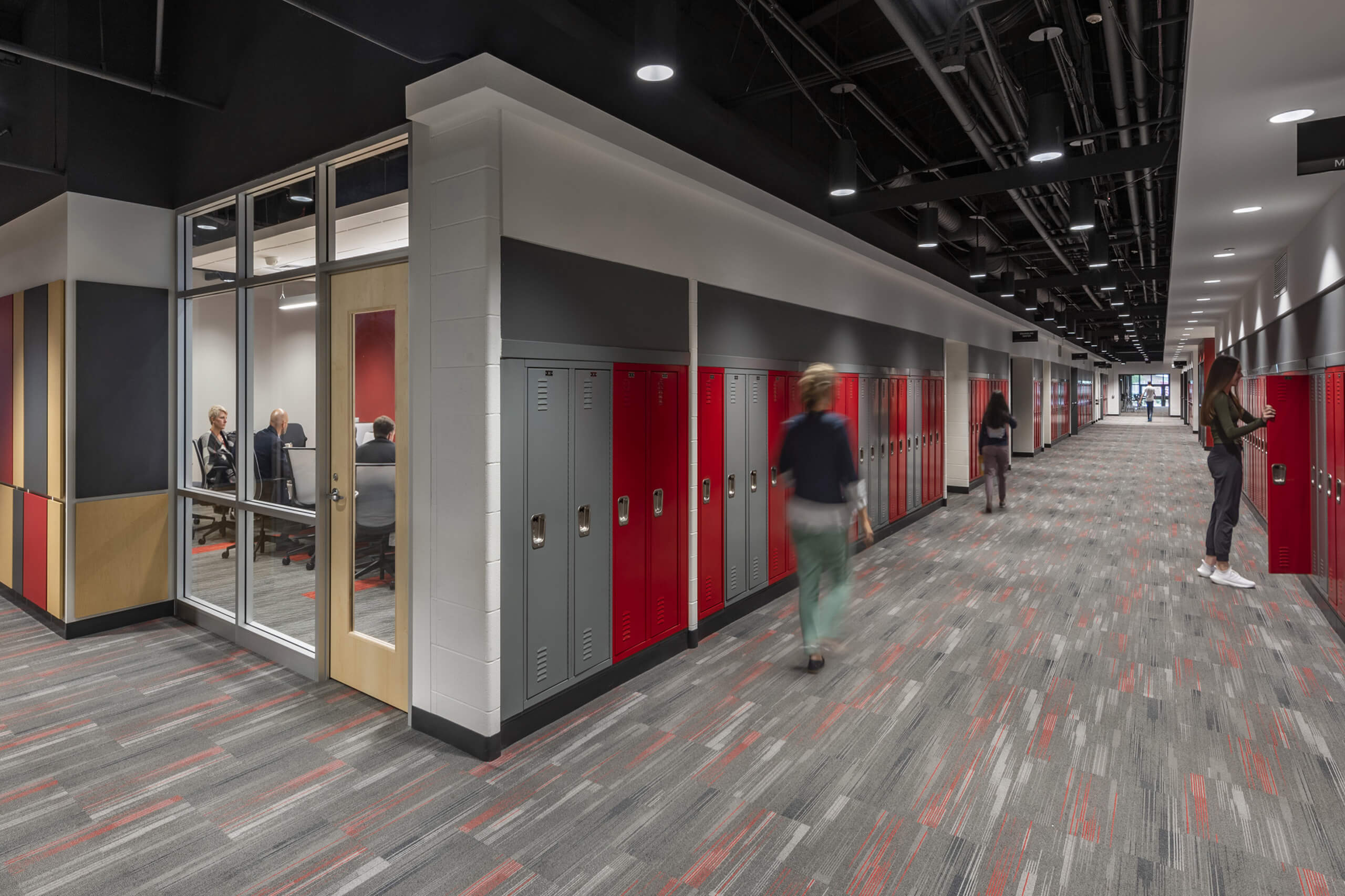 Rendering of students walking down a hallway with lockers