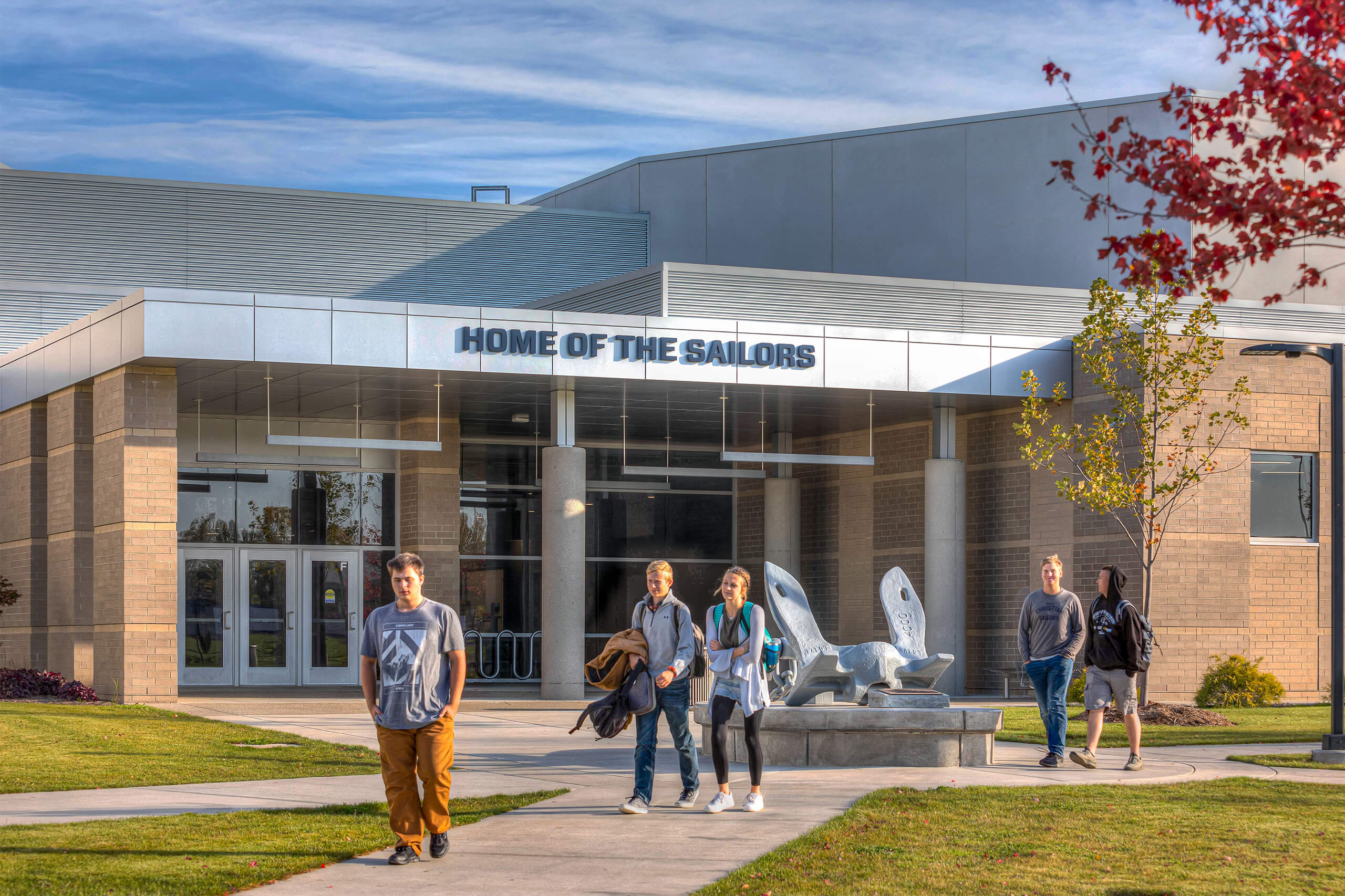 Five students walking in front of South Christian High School