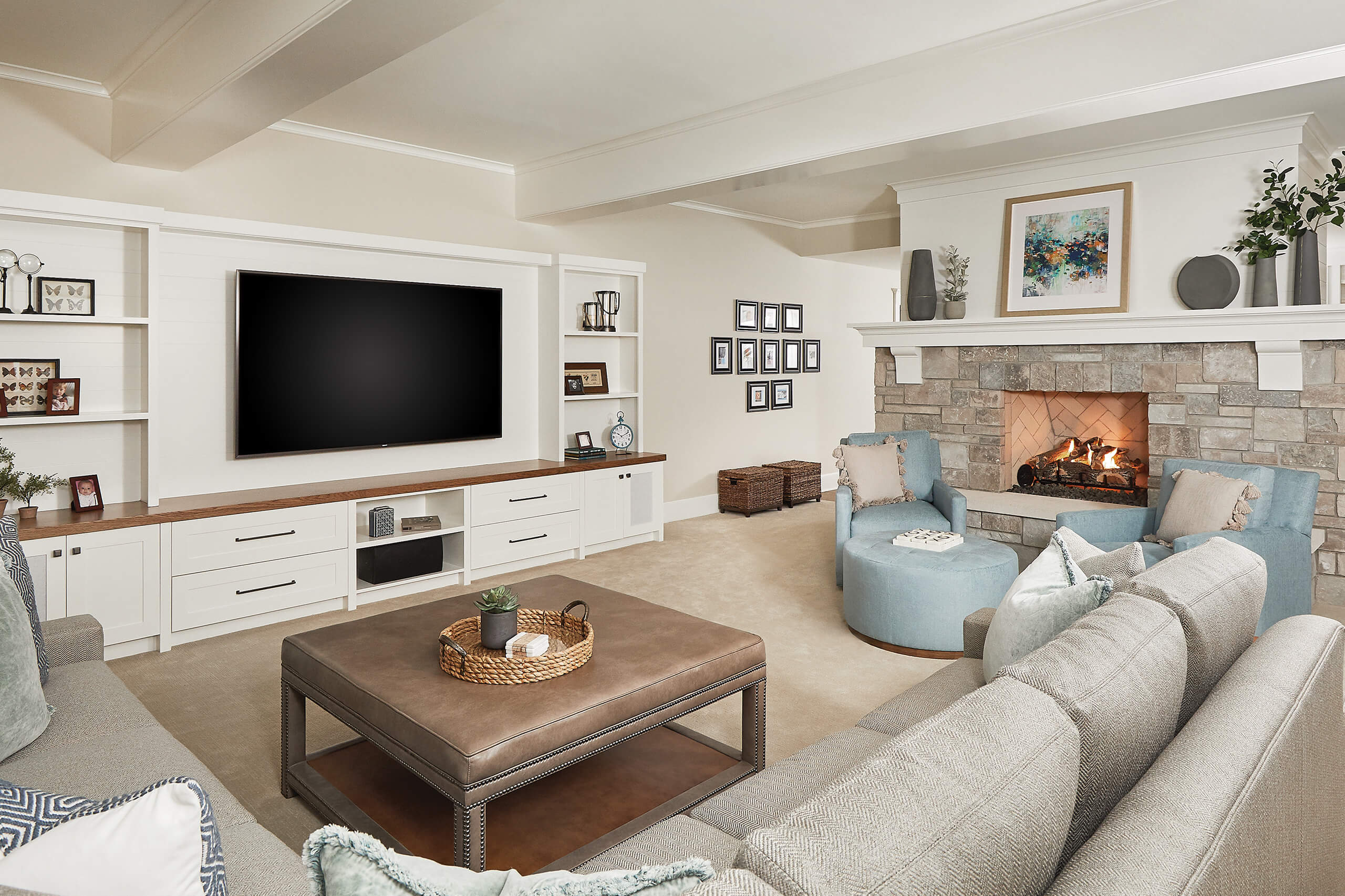 residential family home seating area with TV and fireplace