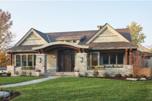 residential home exterior view of the front door porch and yard