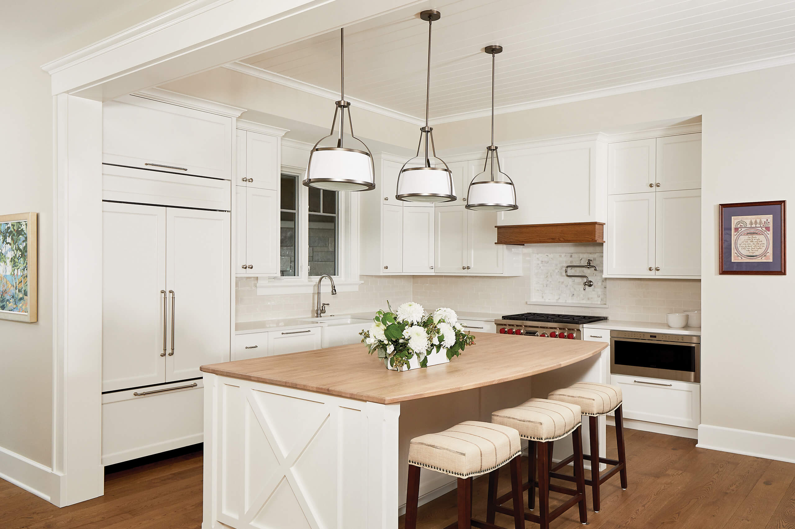 residential family home interior of a kitchen with white cabinet and walls