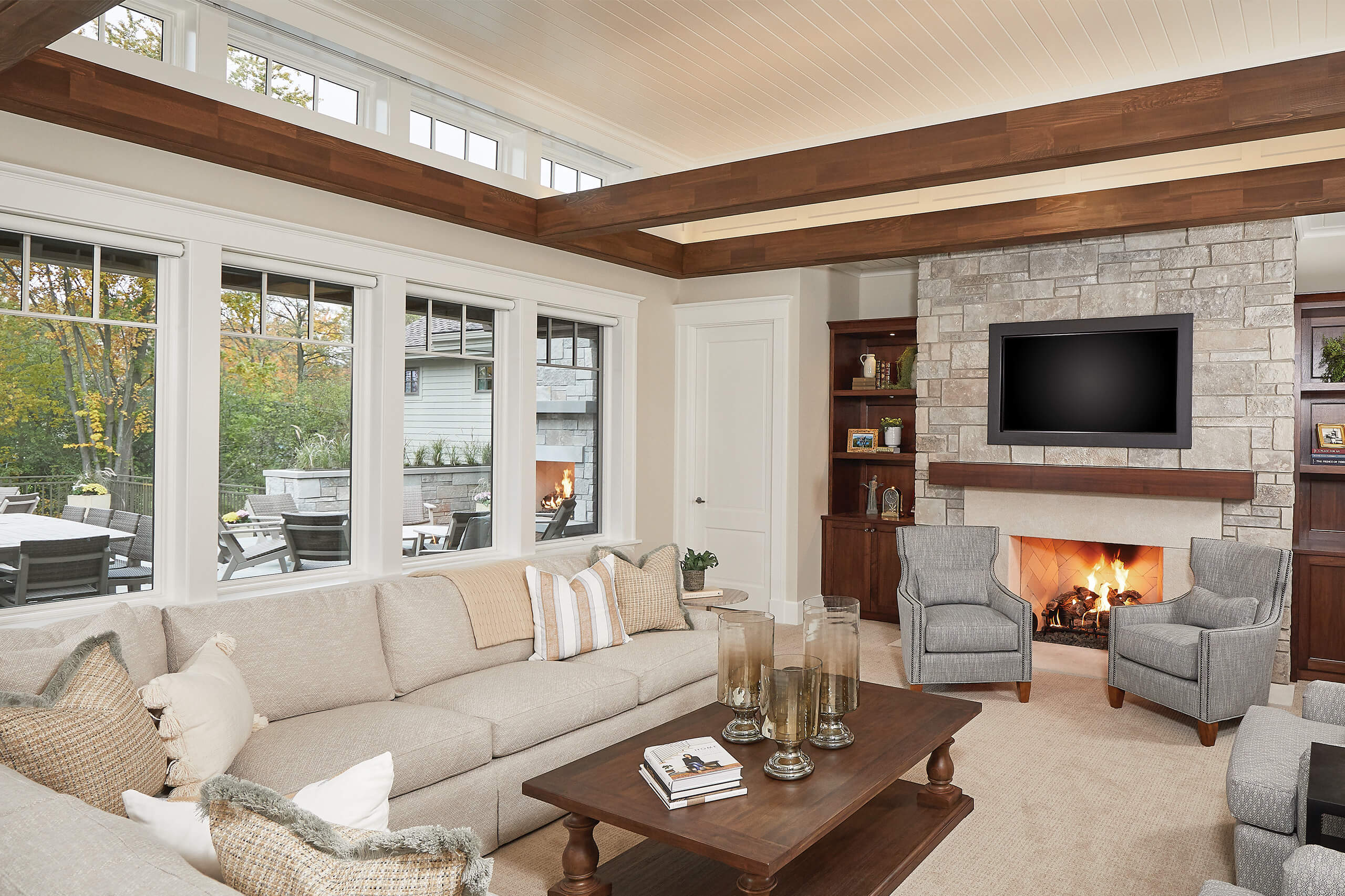 residential home interior inside the seating area with a fireplace