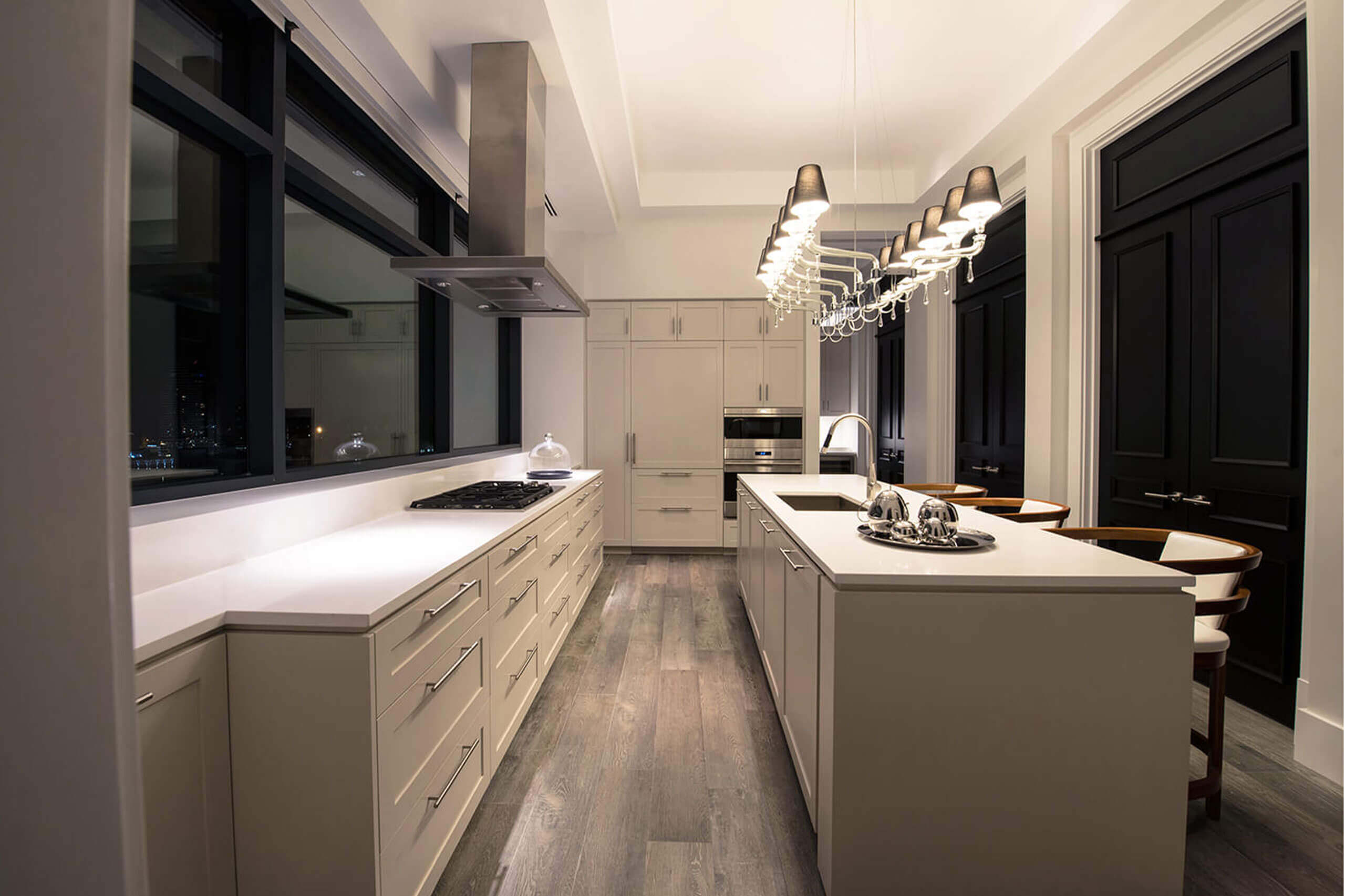 galley kitchen inside a residential urban penthouse