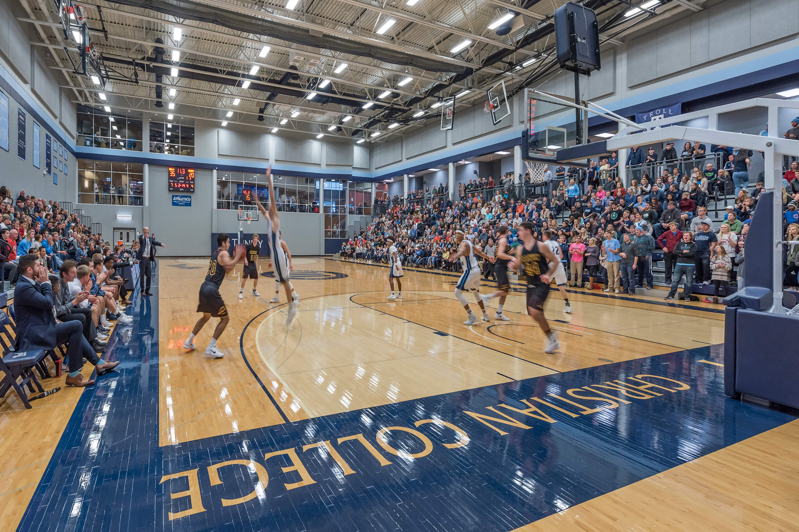 Full stands watching the basketball game at Trinity Christian College Athletic and Recreation Center