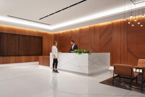 interior rendering of a modern wood paneled office lobby with white marble