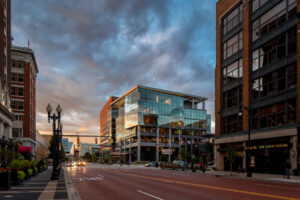 exterior city view showcasing a modern glass office building downtown Grand Rapids