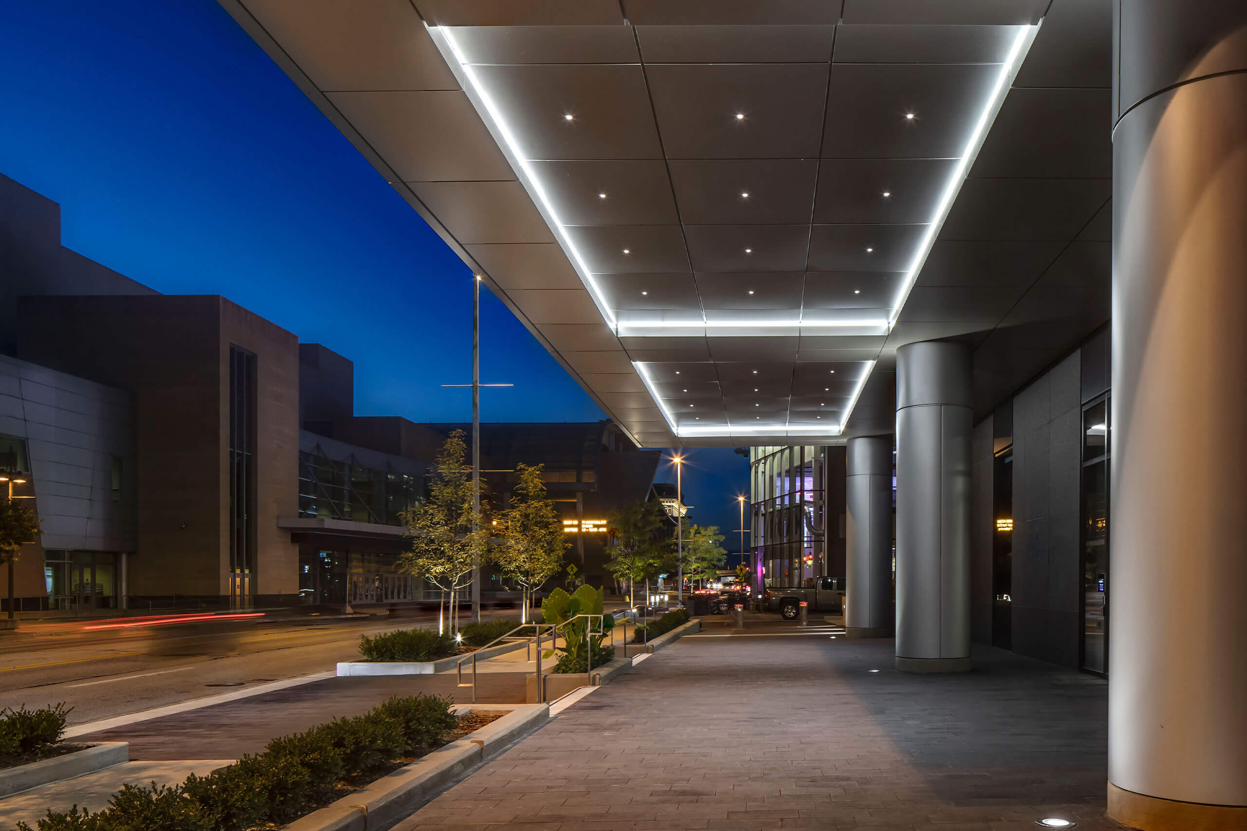 exterior city view showcasing a modern glass office building downtown Grand Rapids