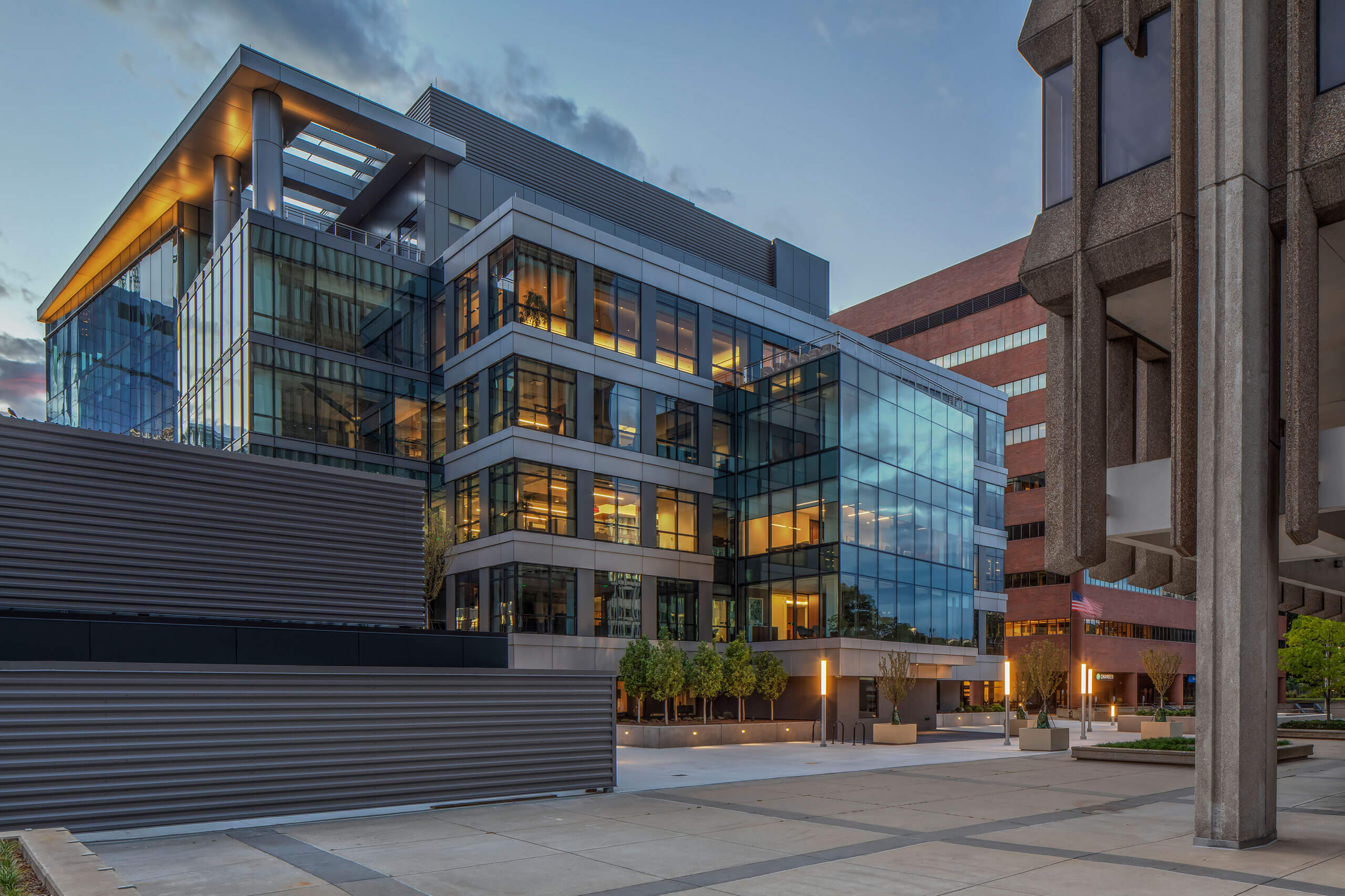 exterior city view showcasing a modern glass office building downtown Grand Rapids