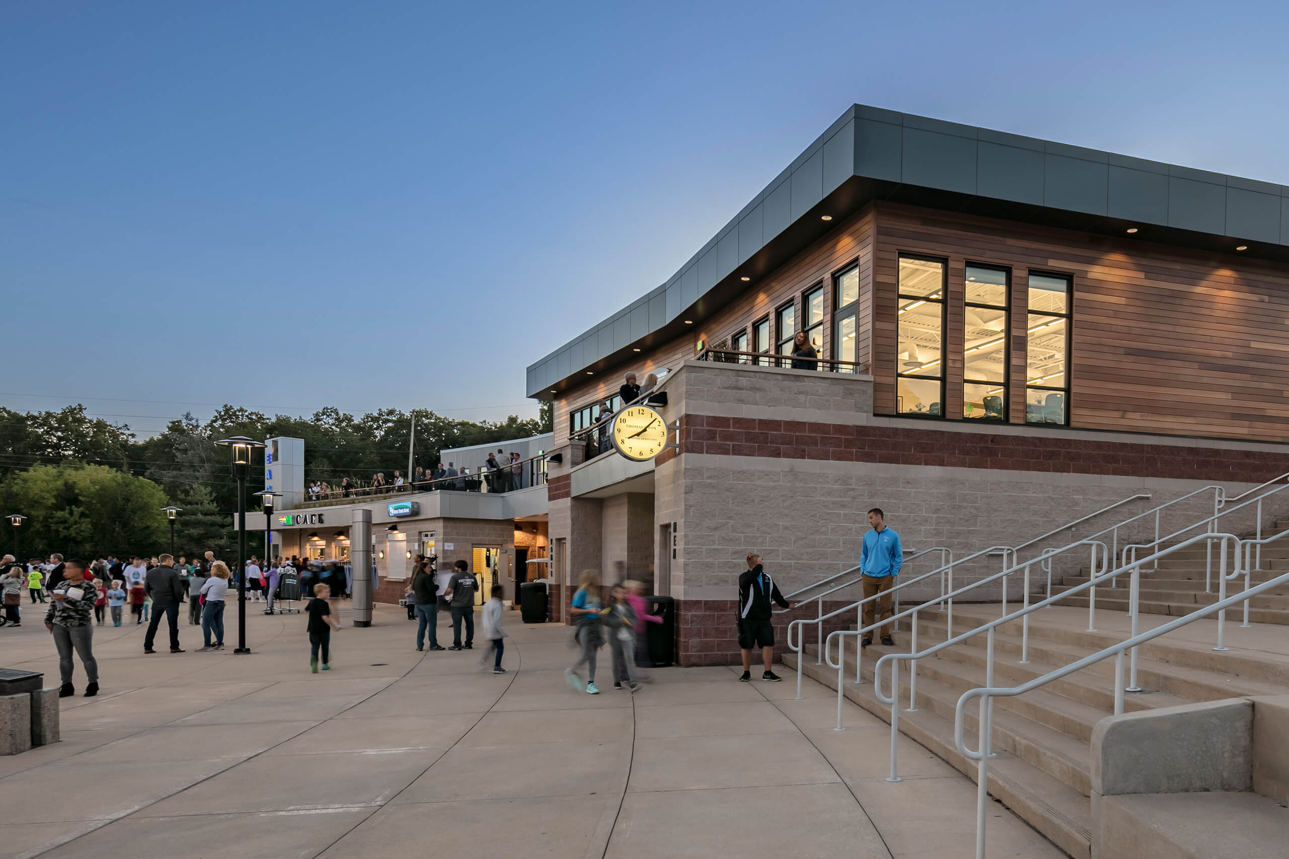 exterior view of the Grand Rapids Christian School admin building with people walking around