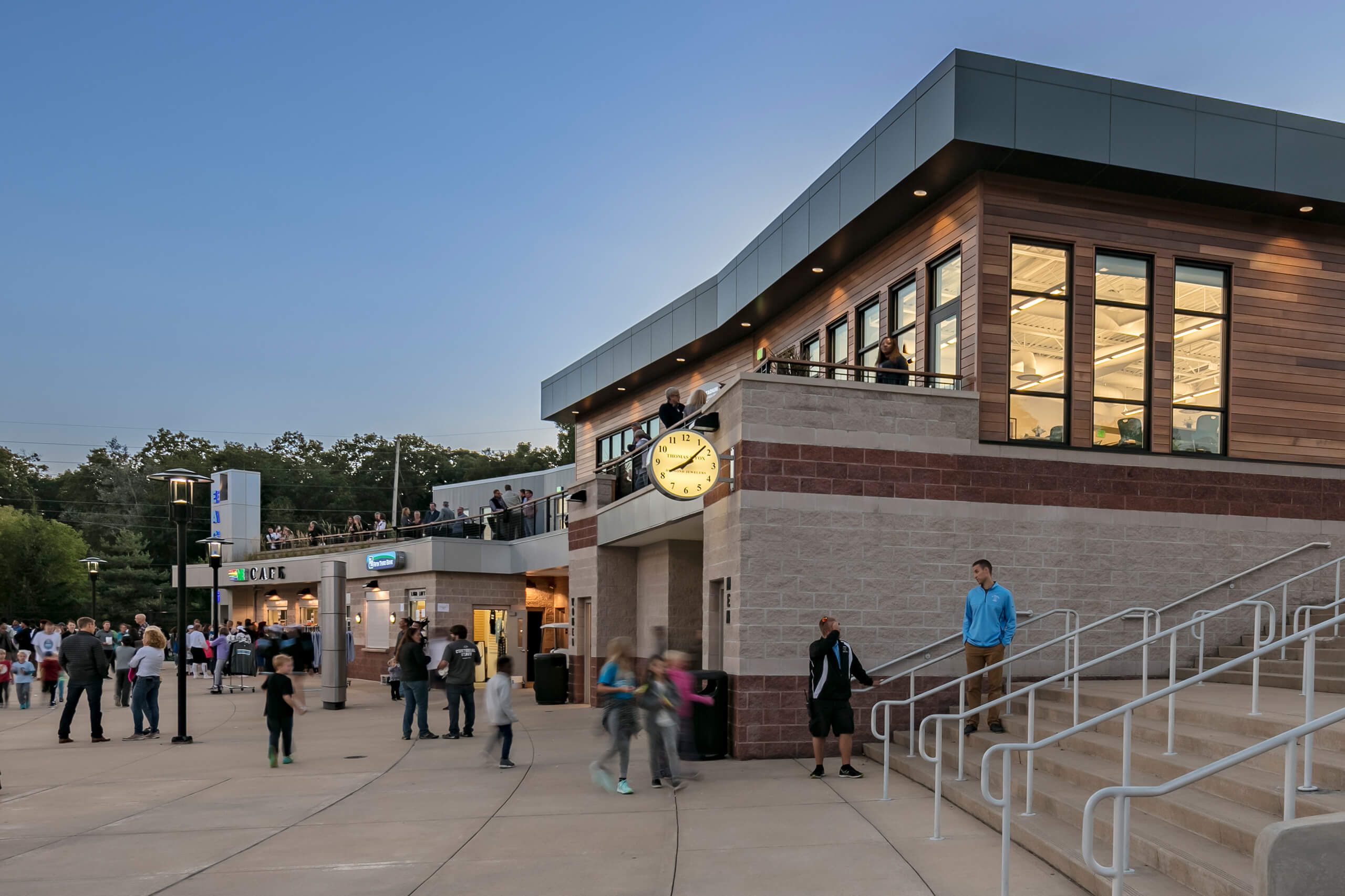 exterior view of the Grand Rapids Christian School admin building with people walking around