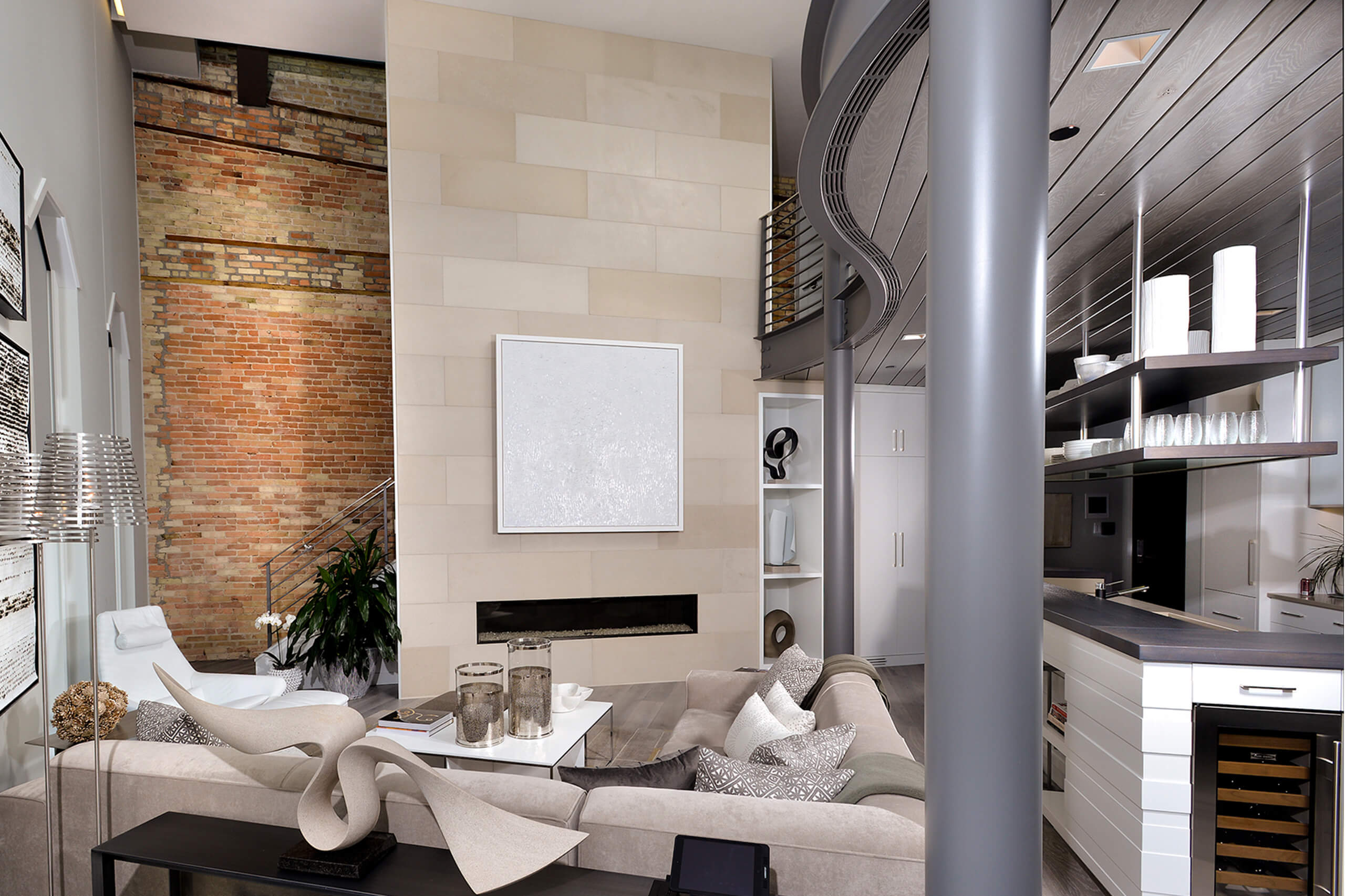 interior of an urban loft with seating area and fireplace