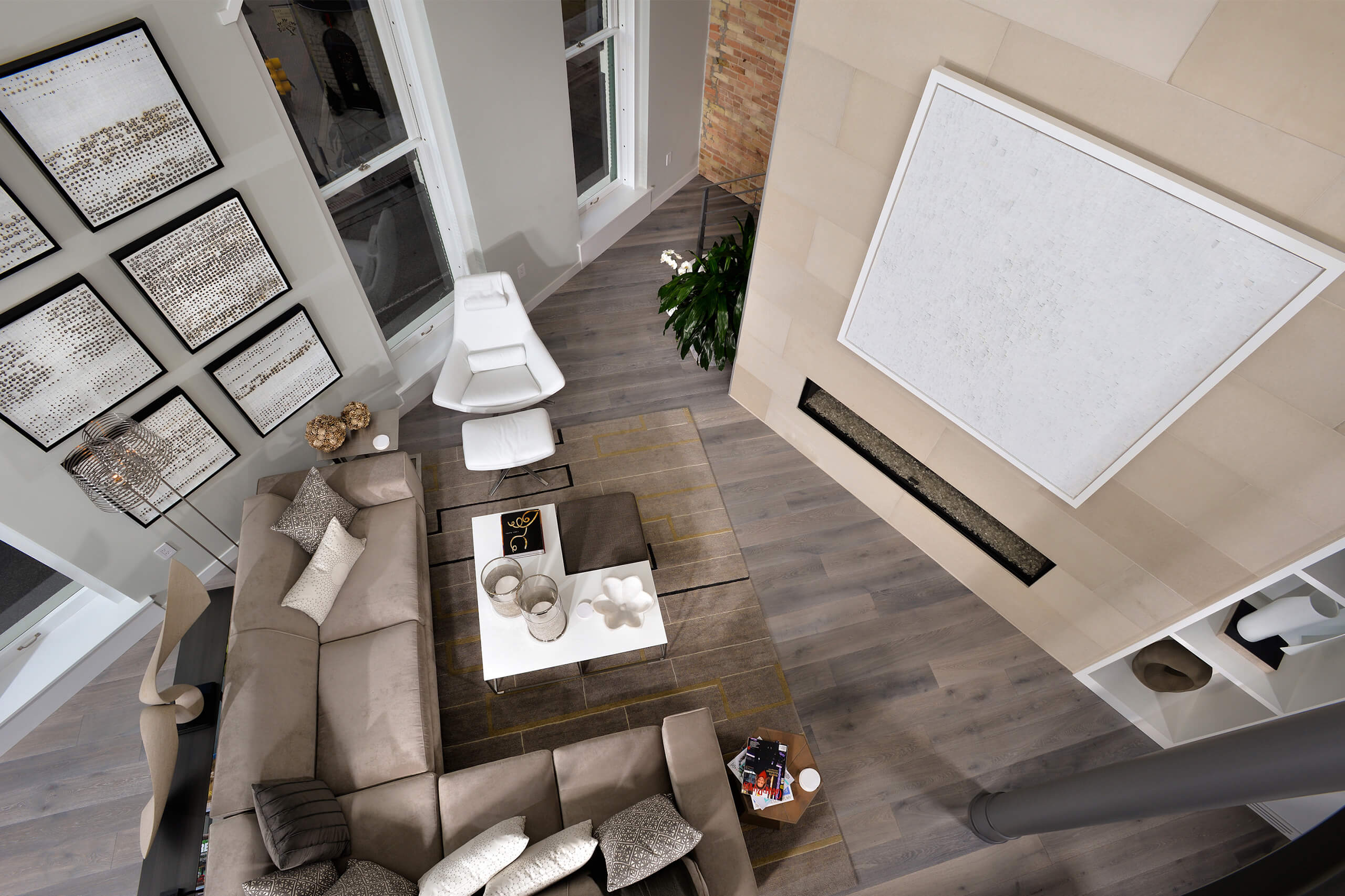 top-down photo of the living room seating area in an interior of an urban loft