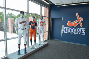 Mannequins wearing Hope College athletic uniforms