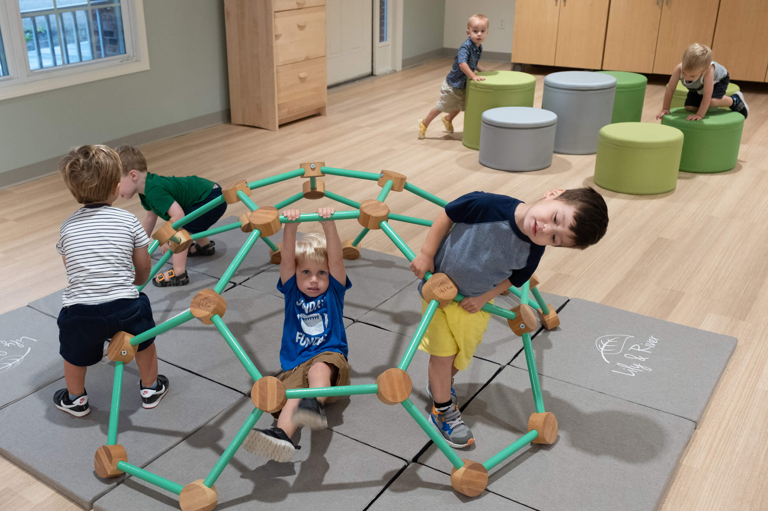 St. Paul the Apostle - Early Childhood Center boys on jungle gym climbing tower