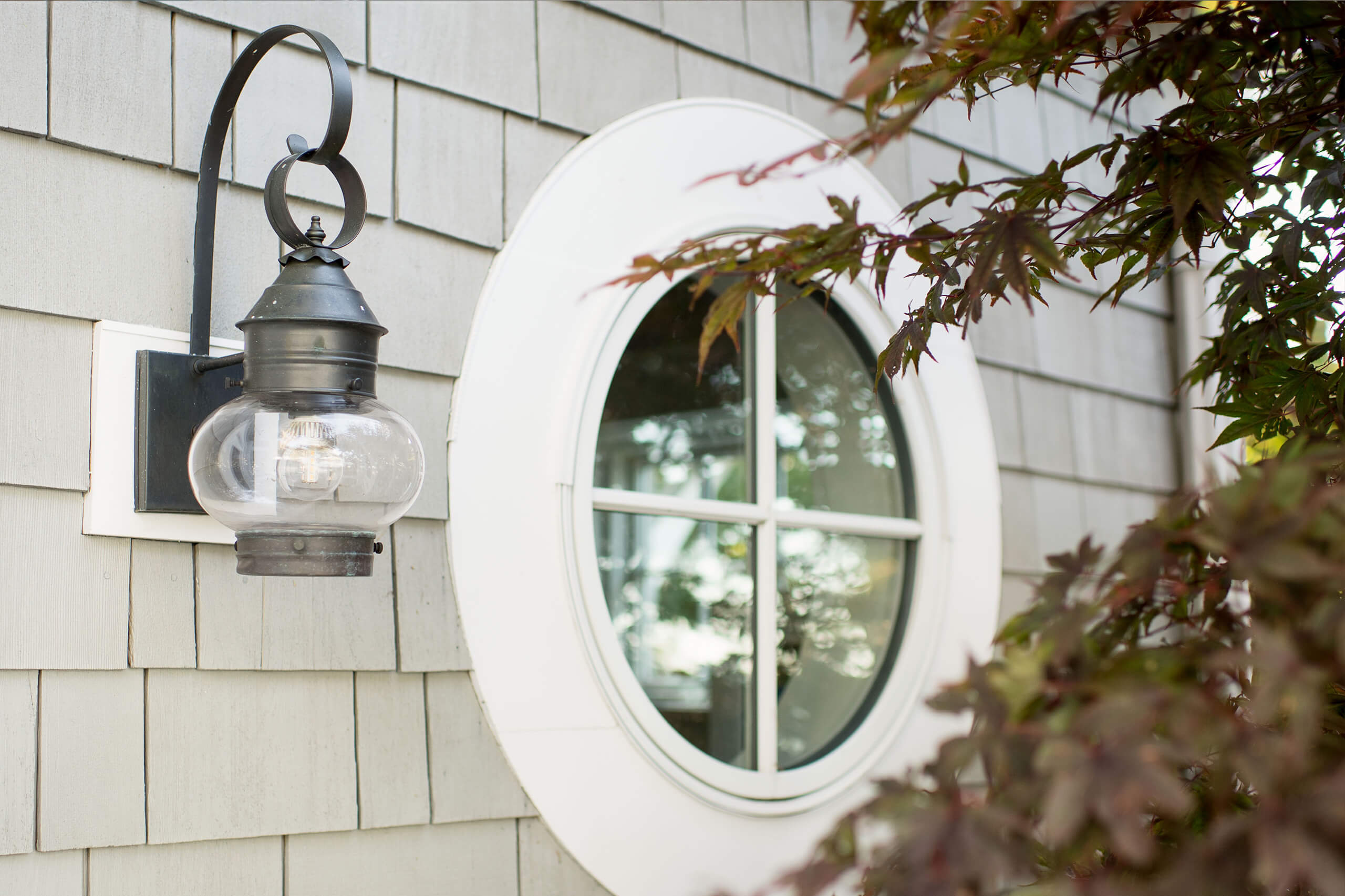 detail of circular window and exterior light