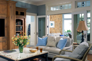 cottage living room with open doors to patio