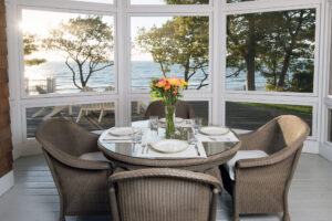 patio dining table overlooking a lake