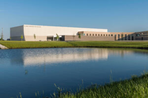 exterior of Illiana Christian High School overlooking a pond